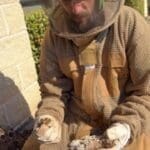 C19849ea-c414-4f27-9f8f-1bf8b5465a61_4_5005_c | Southern Pest Management Hive Removal - tech examining comb